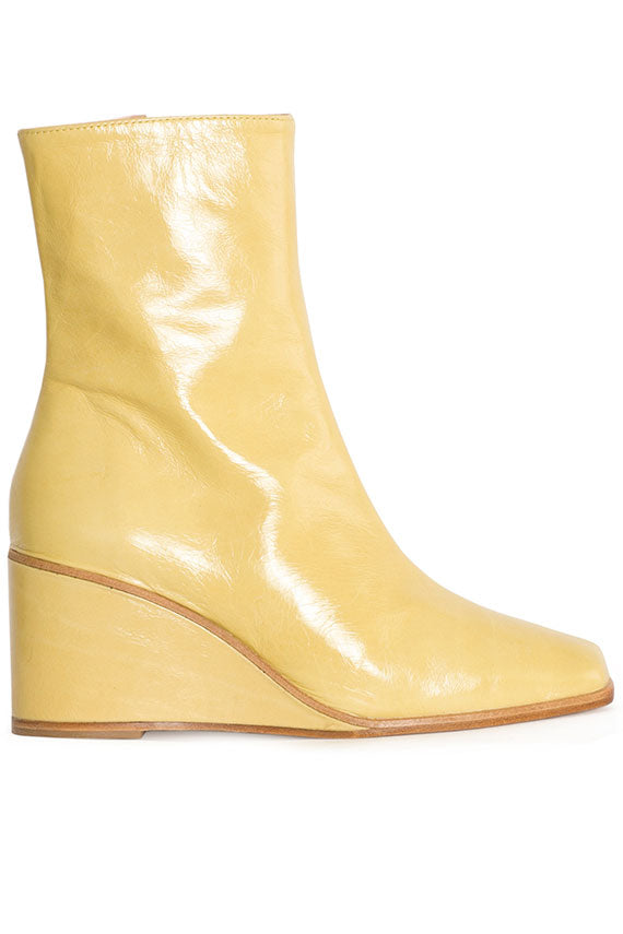 yellow wedge boots