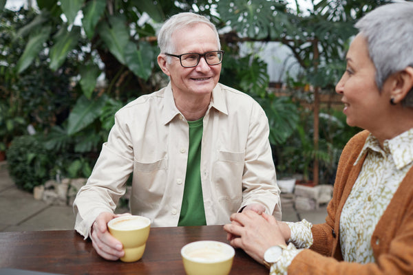Senior couple having coffee together 