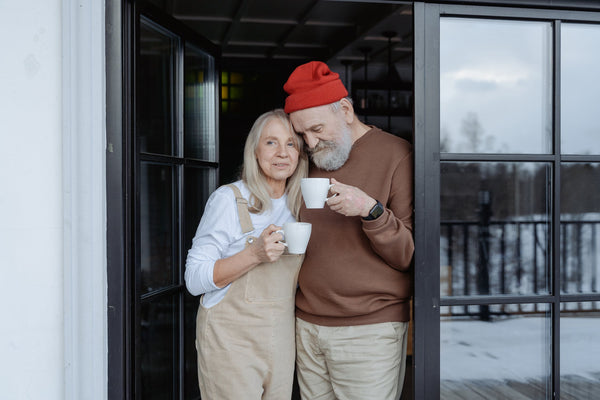 A senior couple having coffee