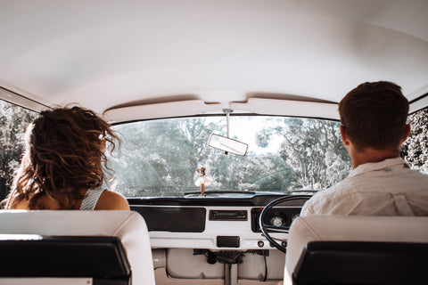 A couple sitting in a car