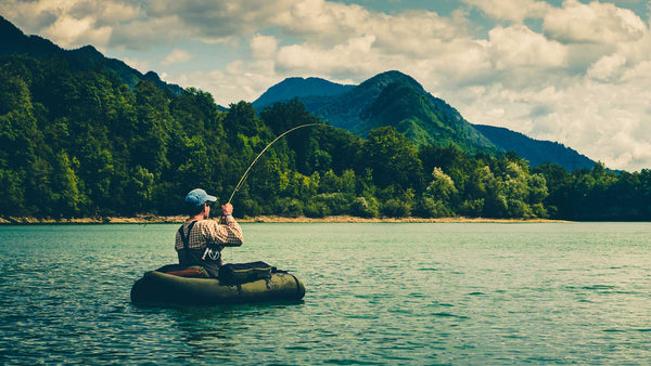 Man Fishing on Lake