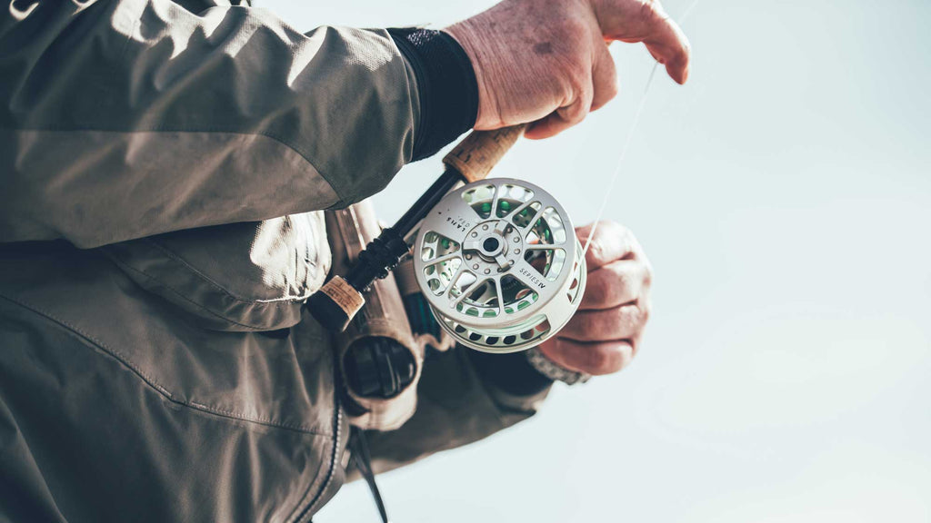 Man Holding Fly Rod