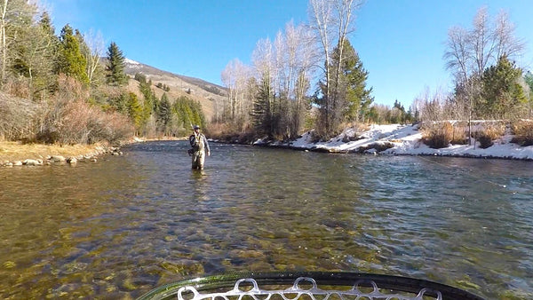 Man fly fishing for rainbow trout