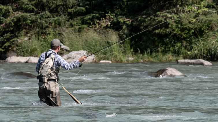 Man changing tempo on his fly fishing cast