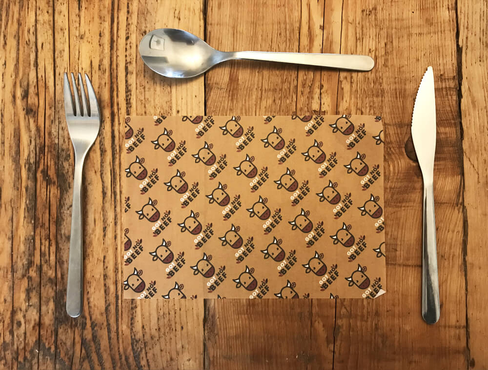 printed greaseproof paper - sheet size  210mm x 148mm