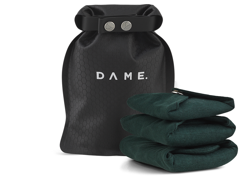 dame reusable period pad set and dry bag.