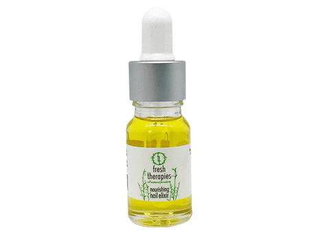 fresh therapies natural vegan nail elixir in glass bottle with white pipette.