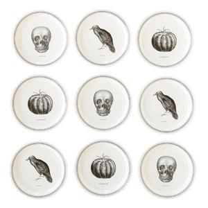 A set of 9 Halloween themed plates sits on a white background. The plates have pumpkins, skulls, and crows printed on them.