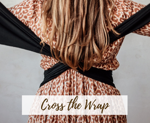 Cross the wrap carrier on your back