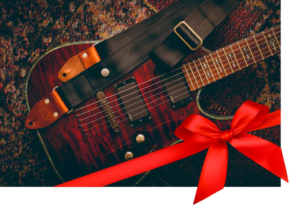 geschenk für gitarristen und bassisten gitarre mit geschenkschleife