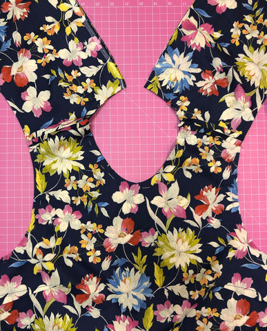 sew around neckline and armholes