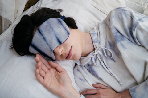 Woman sleeping wearing Thread Tales Marble Tie Dye Eye-Mask