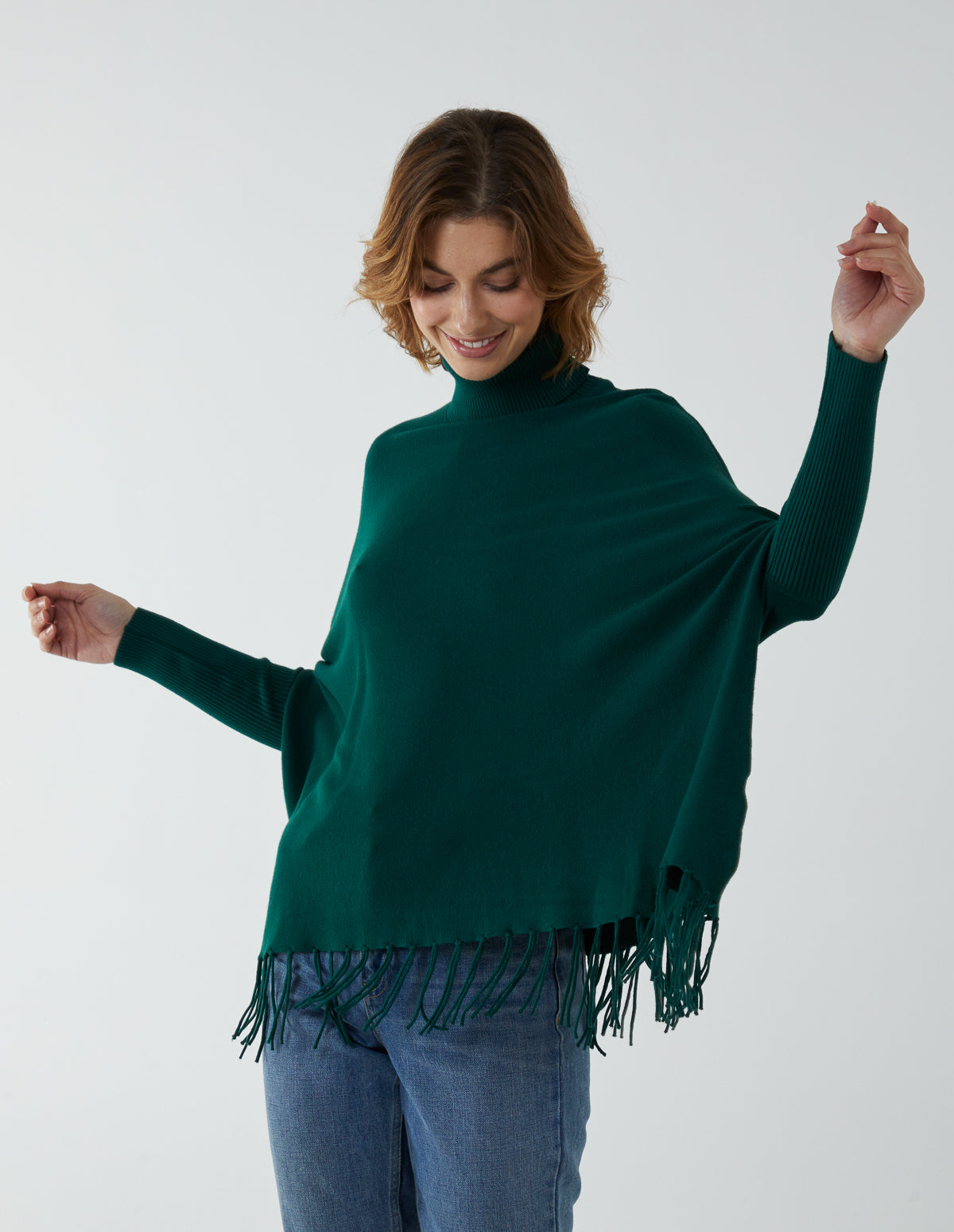 Tassle Hem Roll Neck Poncho 