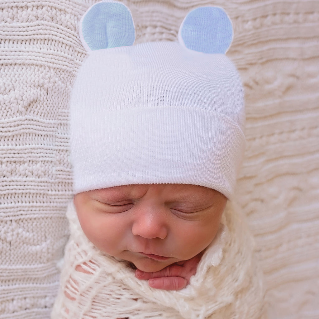 white baby hat with ears