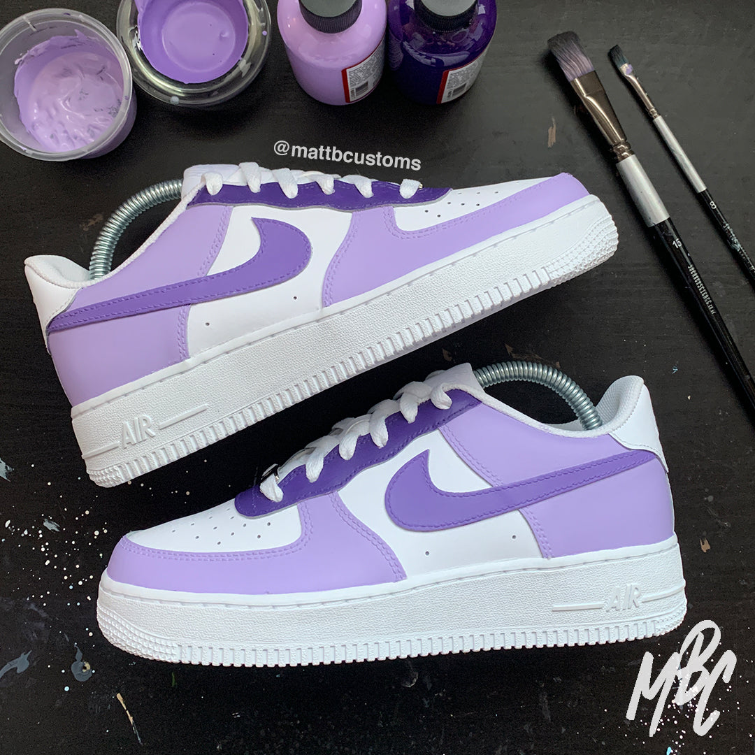 white & purple air force 1 trainers