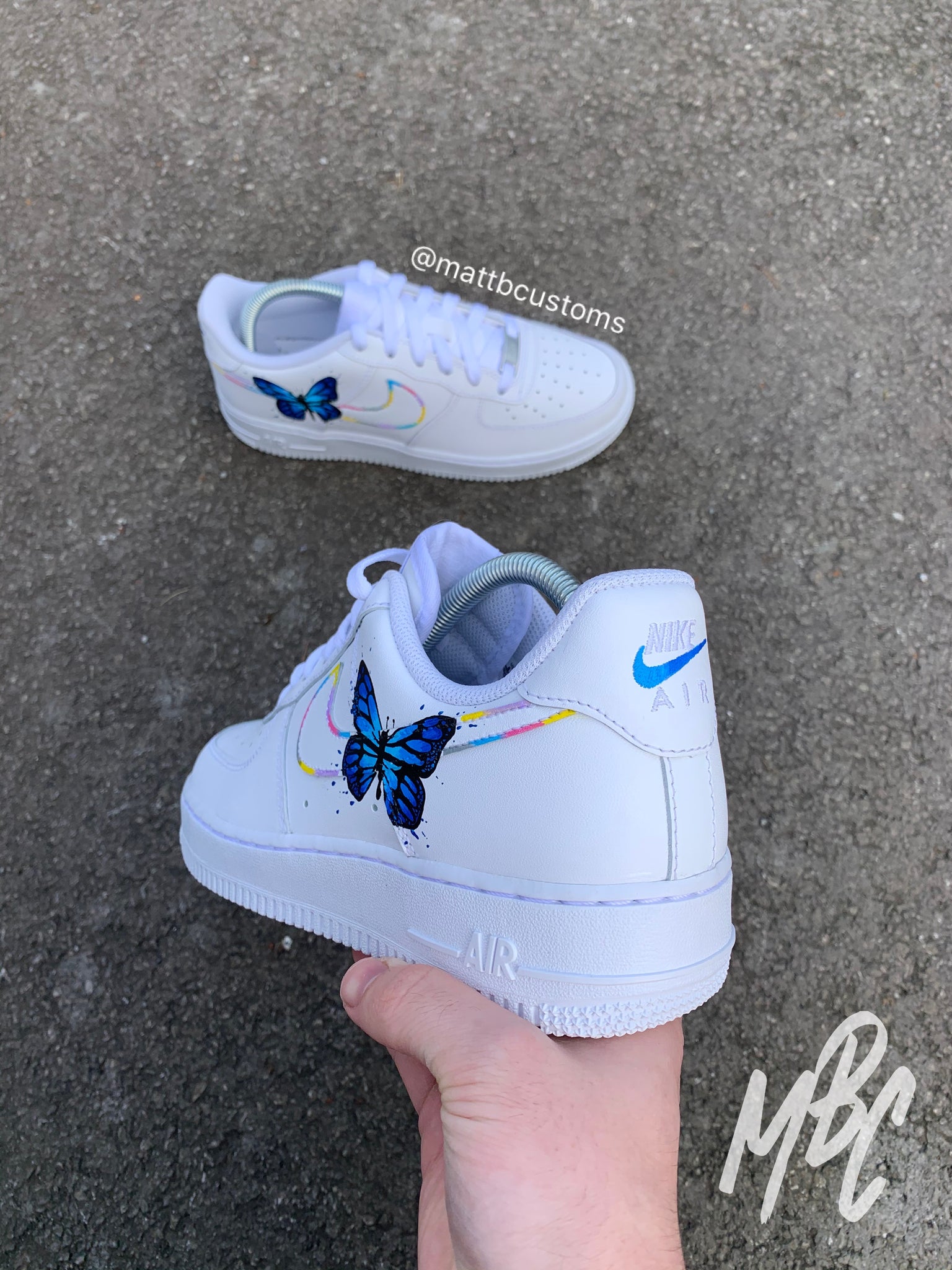 white nike air force butterfly