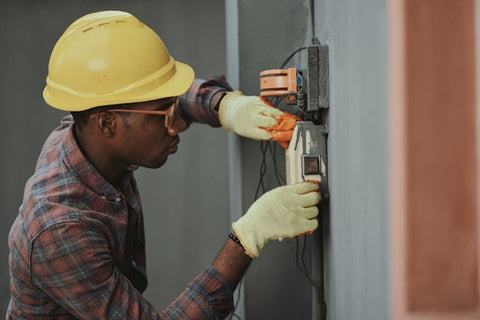 man wearing a hardhat and eye goggles