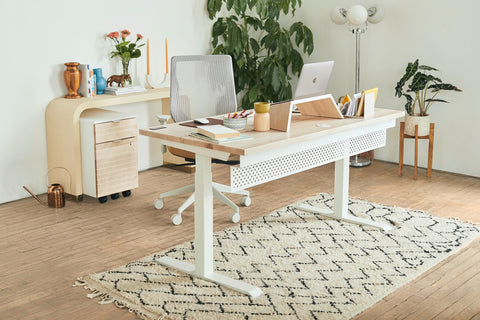 wooden stand for the laptop in a home office