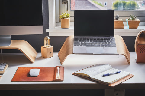 laptop stand and a workplace