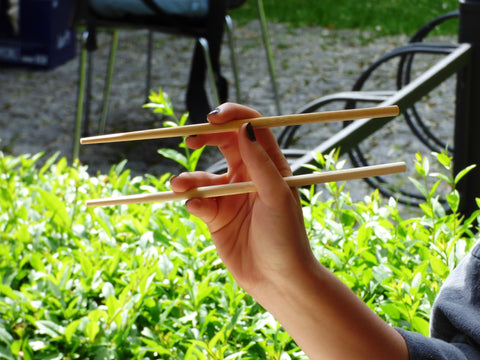 using wooden chopsticks