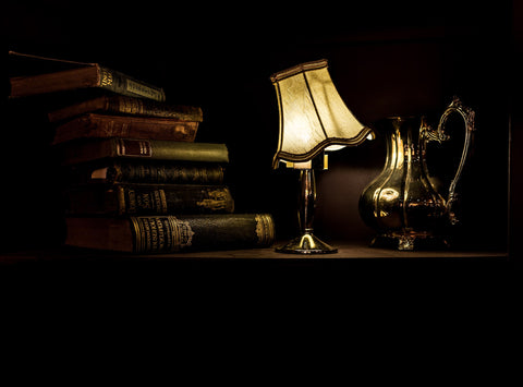 the vintage lamp and the books