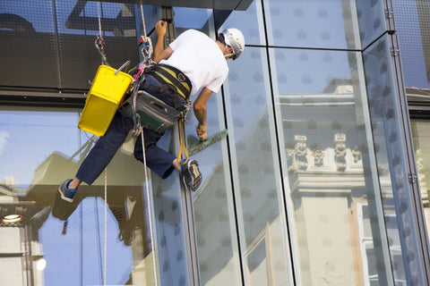 men cleaning building windows