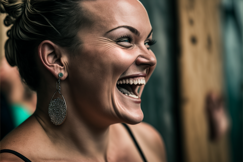 a woman with the metal earrings