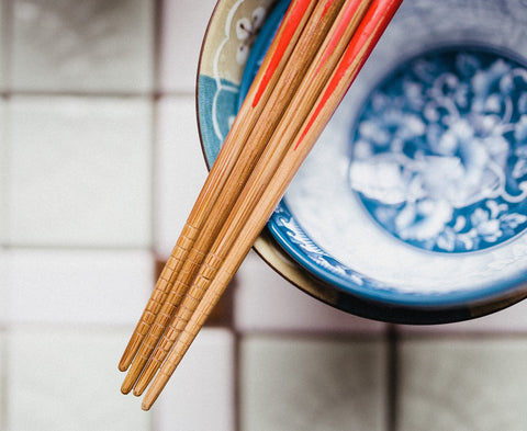 wooden chopsticks and bowl