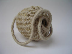 ‘POD’ sculptural basket made from flax fibres and linen thread.