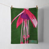 Fuchsia tea towel hanging from a line