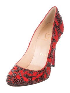 christian louboutin embellished pumps