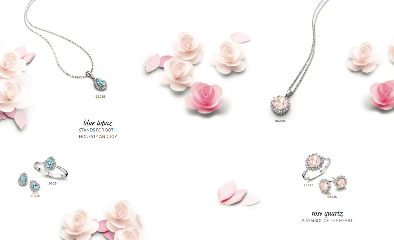 Paper props and delicate paper flowers enhance jewelry photoshoots.