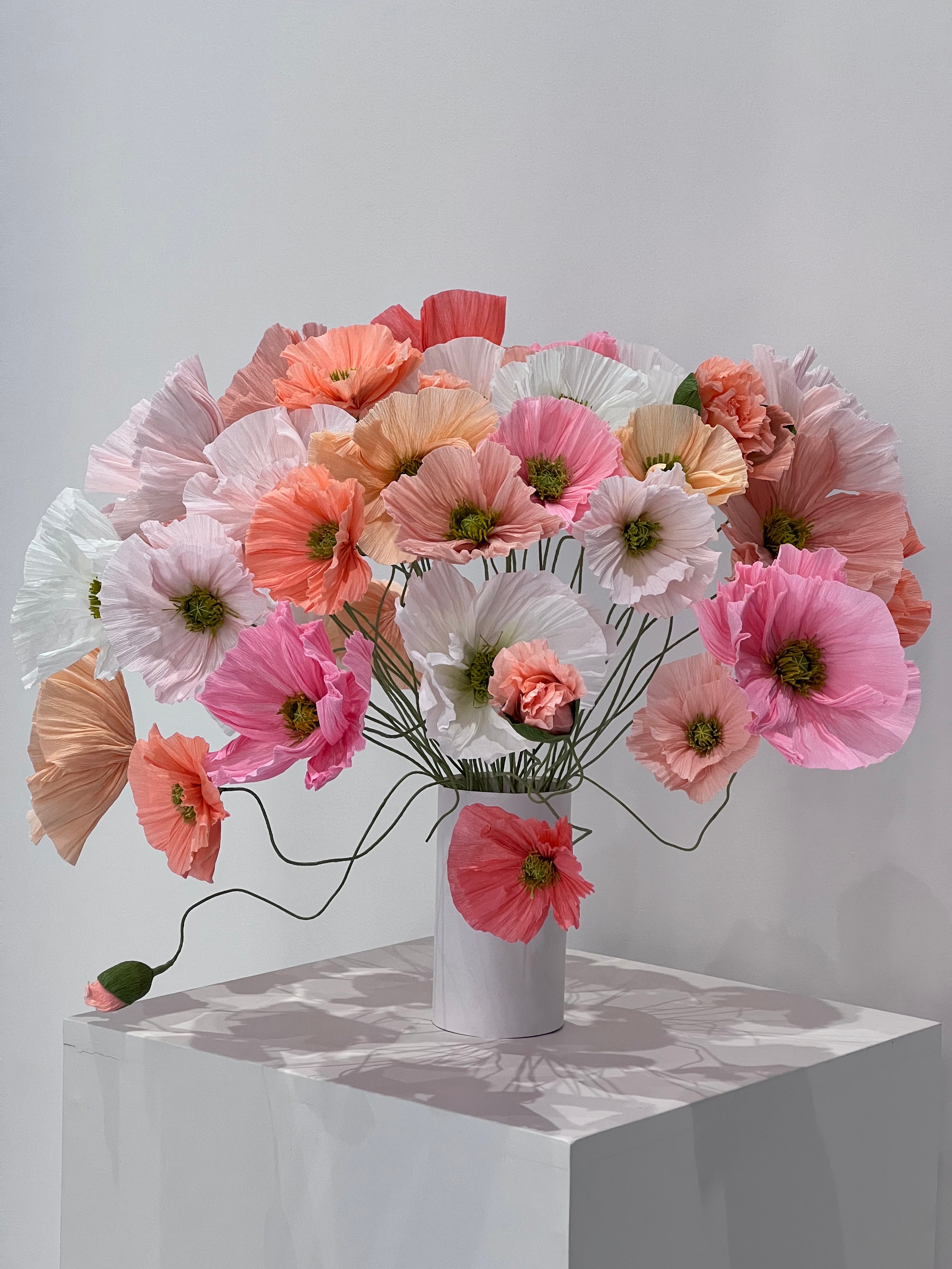 An enchanting arrangement of paper poppies, capturing the beauty and allure of these floral wonders.