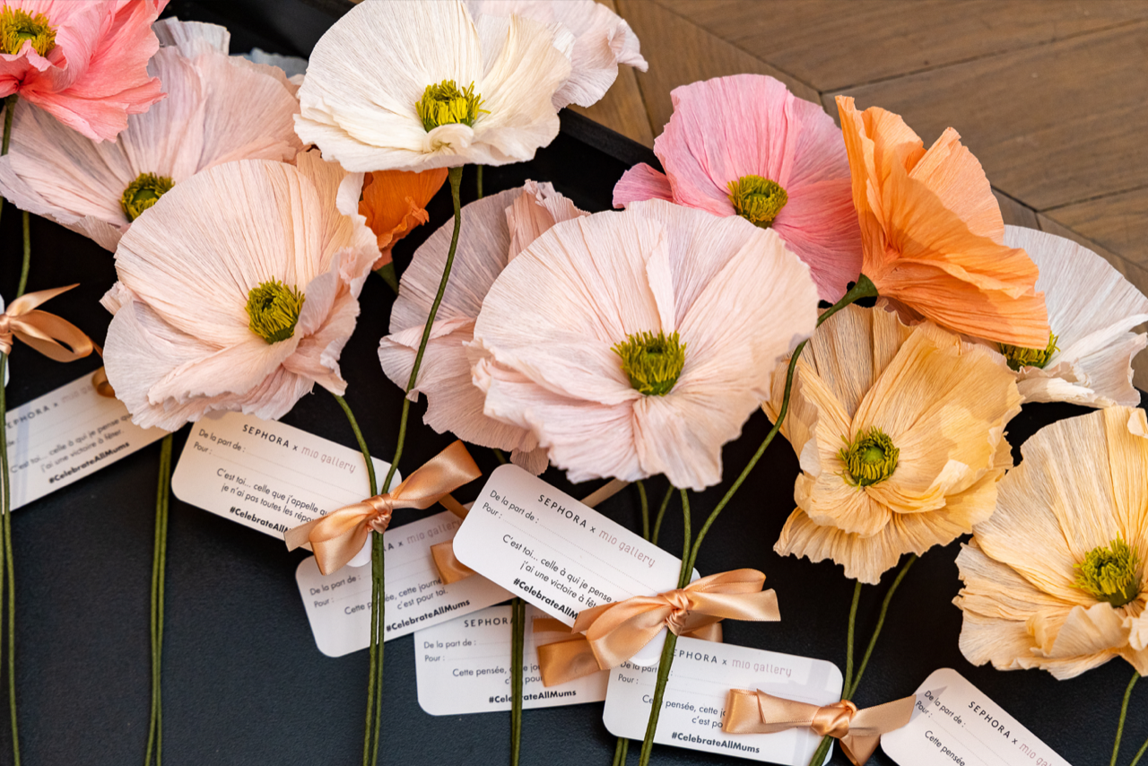 Exquisite paper poppies created by Mio Gallery Paper Art Studio, featuring vibrant colors and delicate details, showcased at Sephora Press Day SS23 event.
