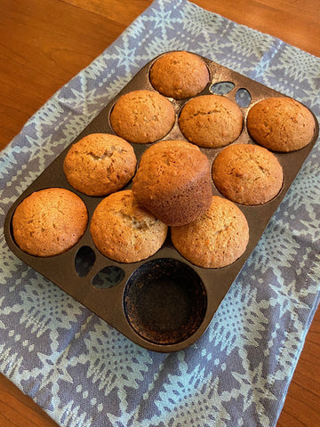 Full view of banana nut muffins in cast iron pan including recipe by Crisbee