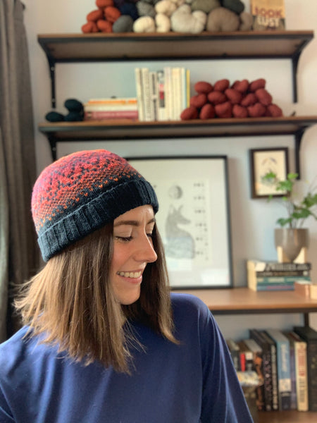 Marketing Coordinator Allison Ause models the Pyramid Hike Hat by Designer Tressa Weidenaar knit in Small batch Ranch 03 and Spincycle American Wool Yarns