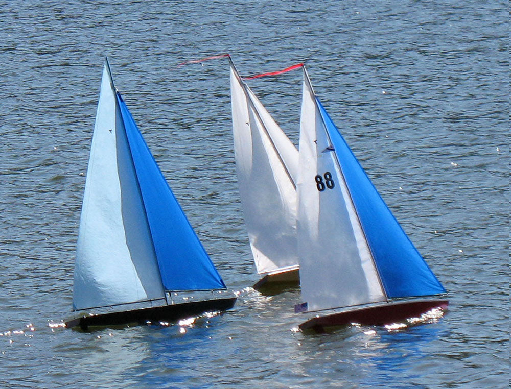 toy sailboat race