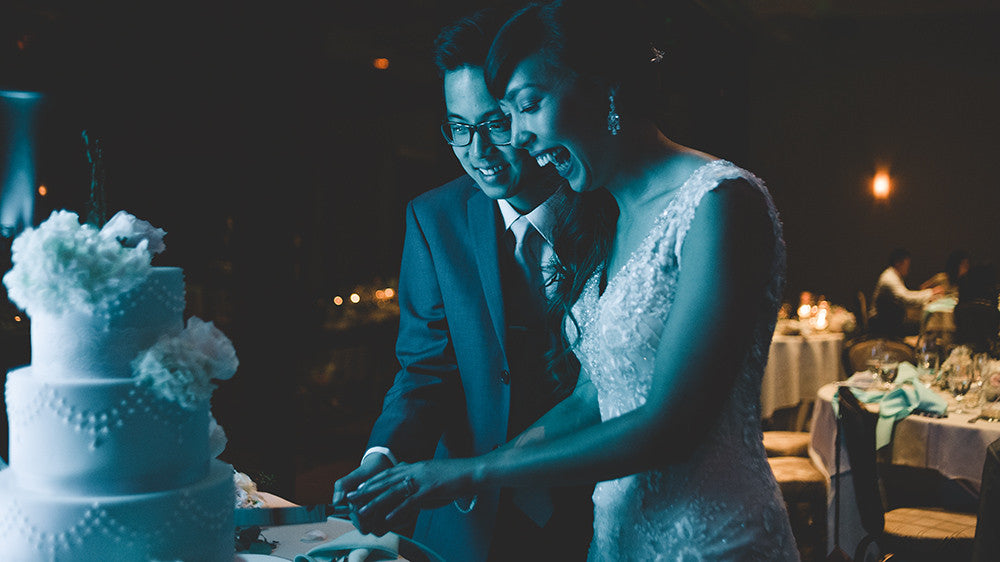 A couple cutting their wedding cake at Spanish Trails Country Club in Las Vegas