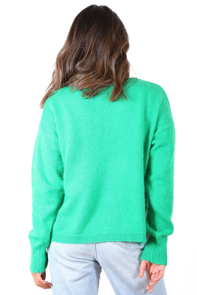 bright green sweater