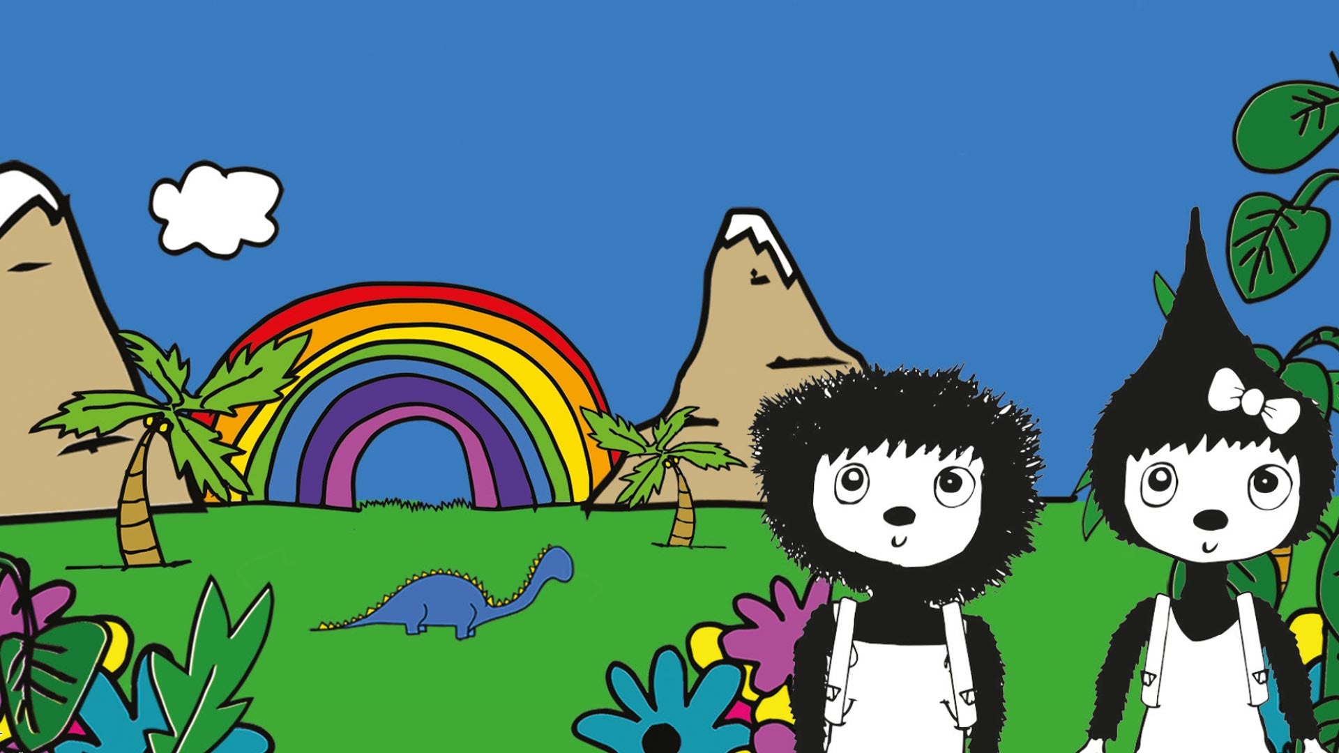 Zip and Zoe standing with grass, rainbow, plants and mountains in the background