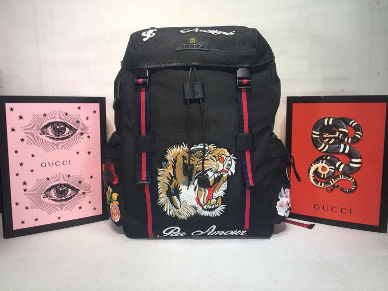 gucci tiger embroidered backpack