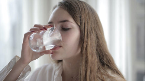 thirsty woman drinking water