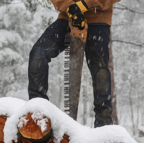 What are the key factors to consider when choosing work pants for cold weather