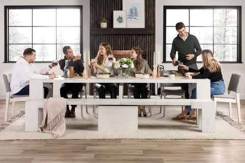 A family siting at a dining table