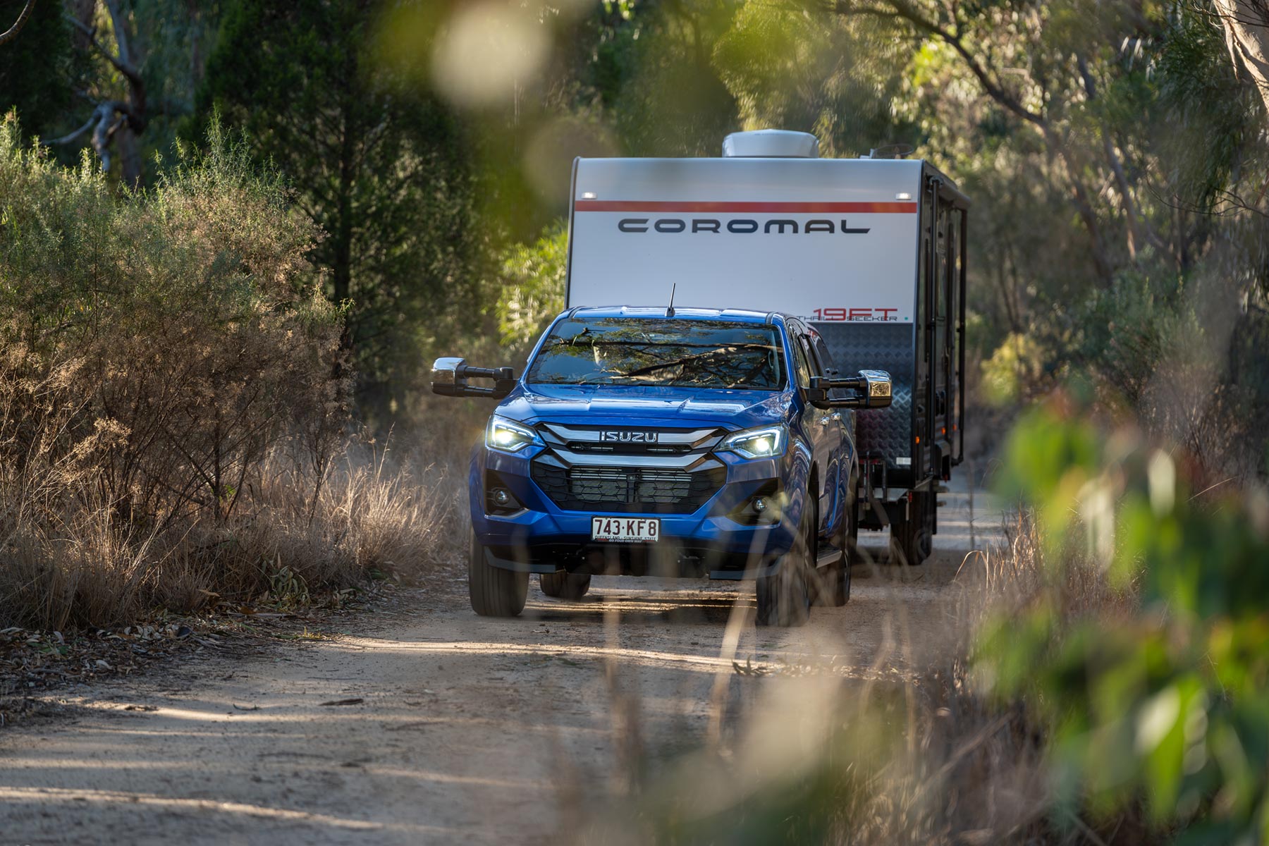 2024 D-MAX LS-U+ TOUR MATE in Neptune Blue towing Coromal