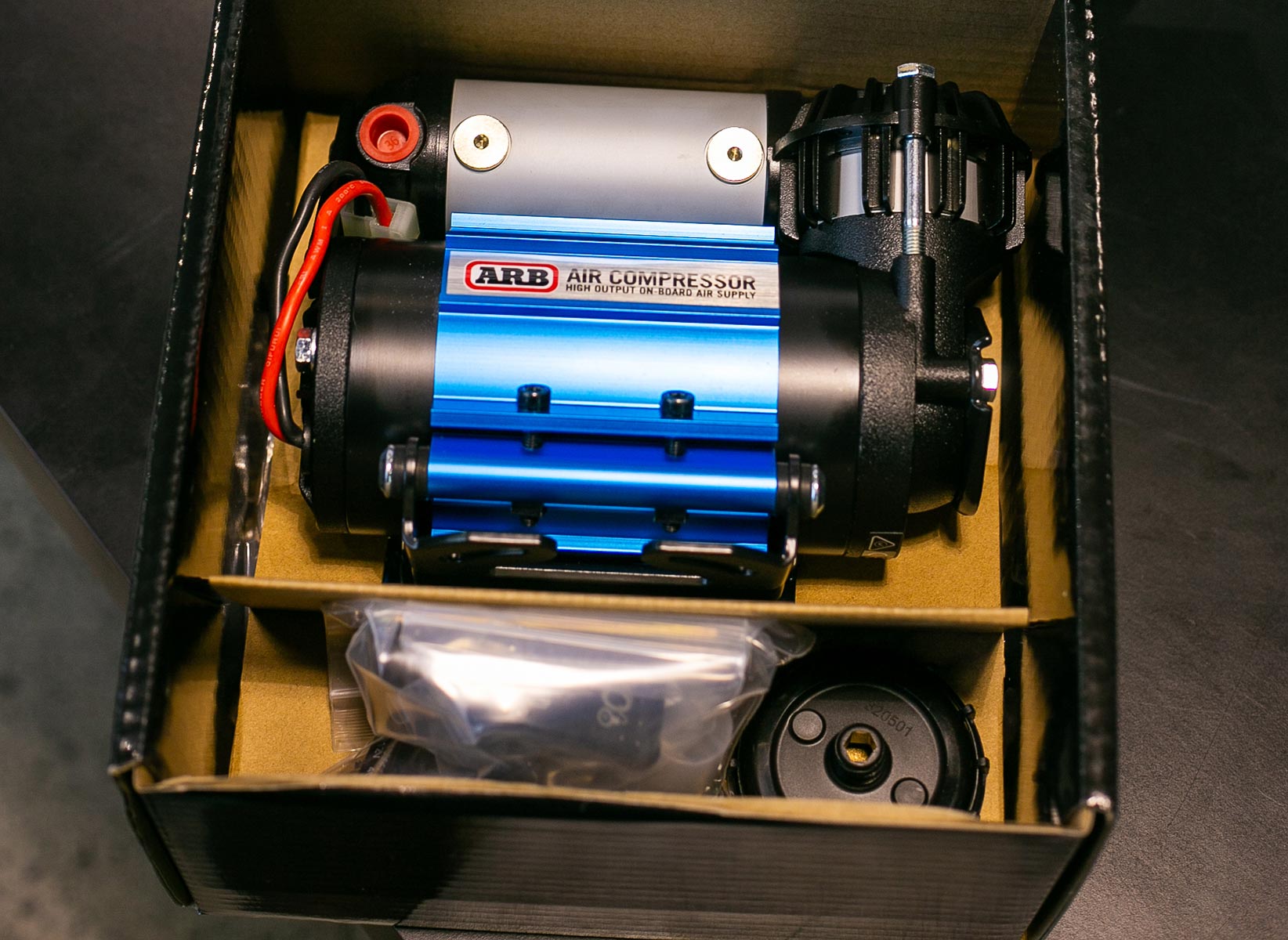 Vehicle mounted air compressor