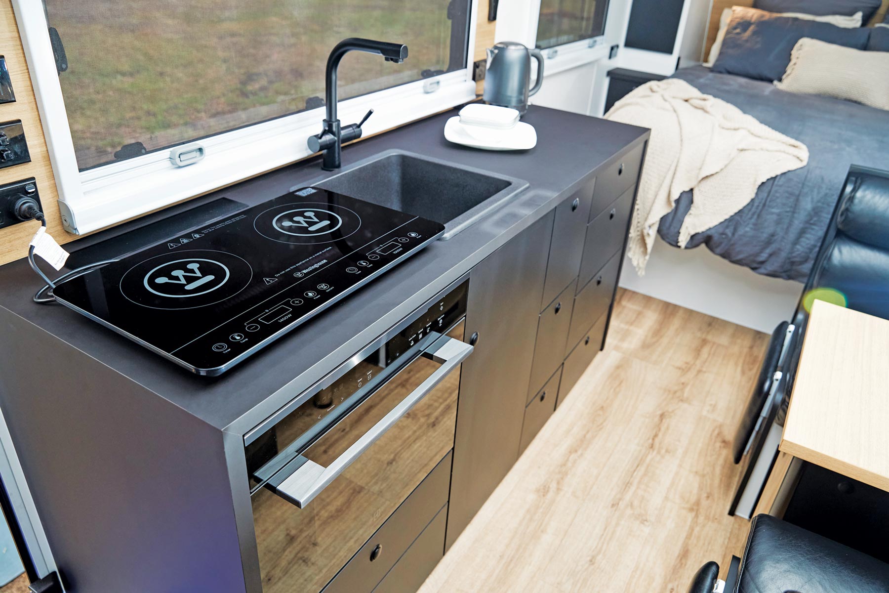 Induction cooktop in SPINIFEX CARAVAN