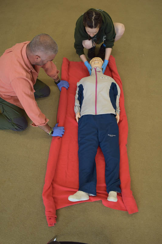 learn to manage a suspected spinal injury with shock.