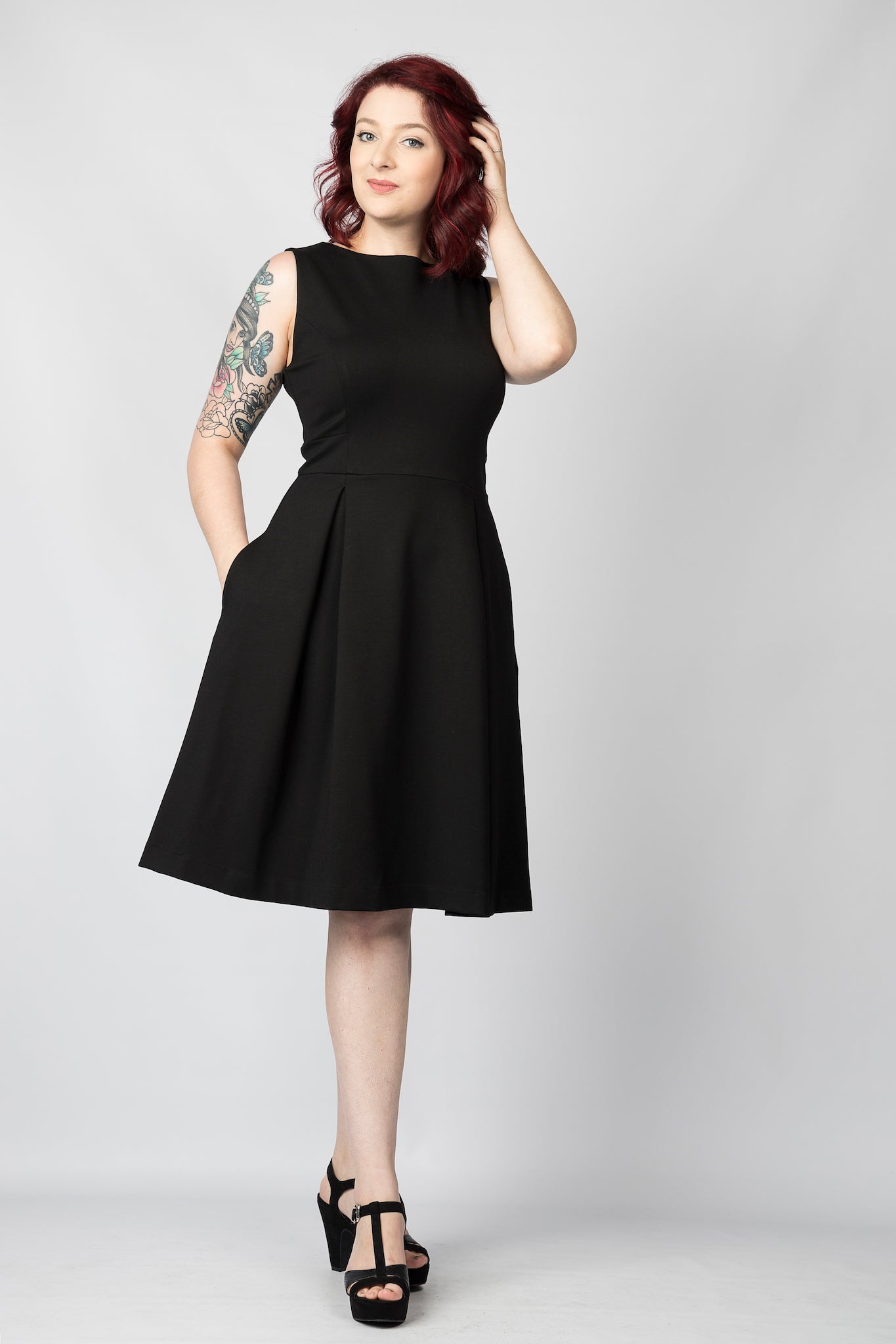 black fit and flare dress with pockets