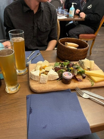 Cheese latter with feline themed beer